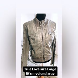 Faux leather jacket with knitted sleeves